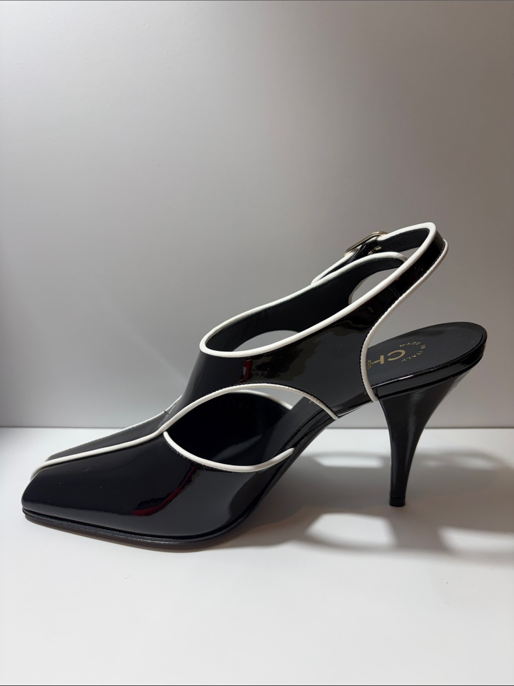 CHANEL Black Patent Slingback Pumps with White Piping - size 36.5